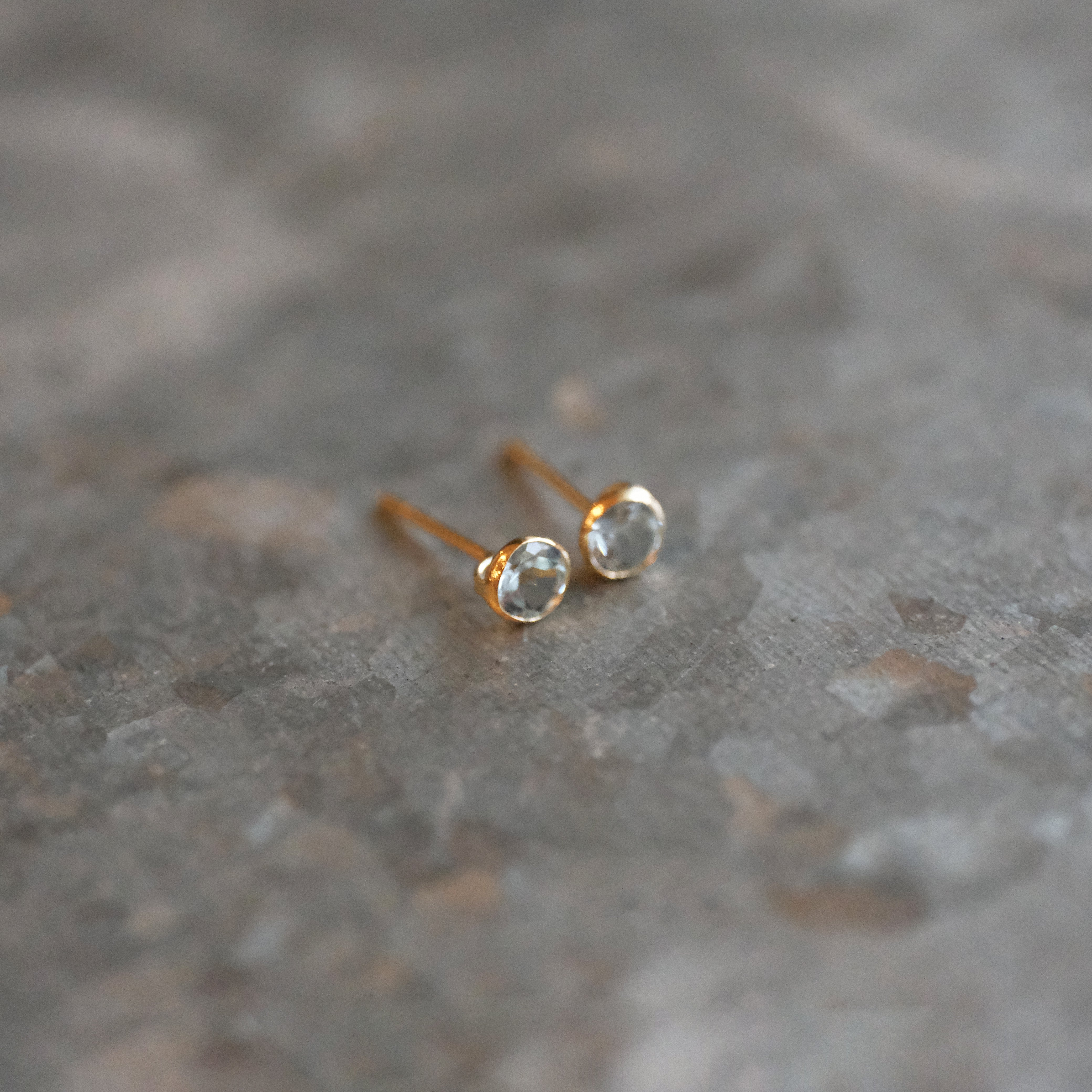 14k + Sky Blue Topaz Saddle Studs