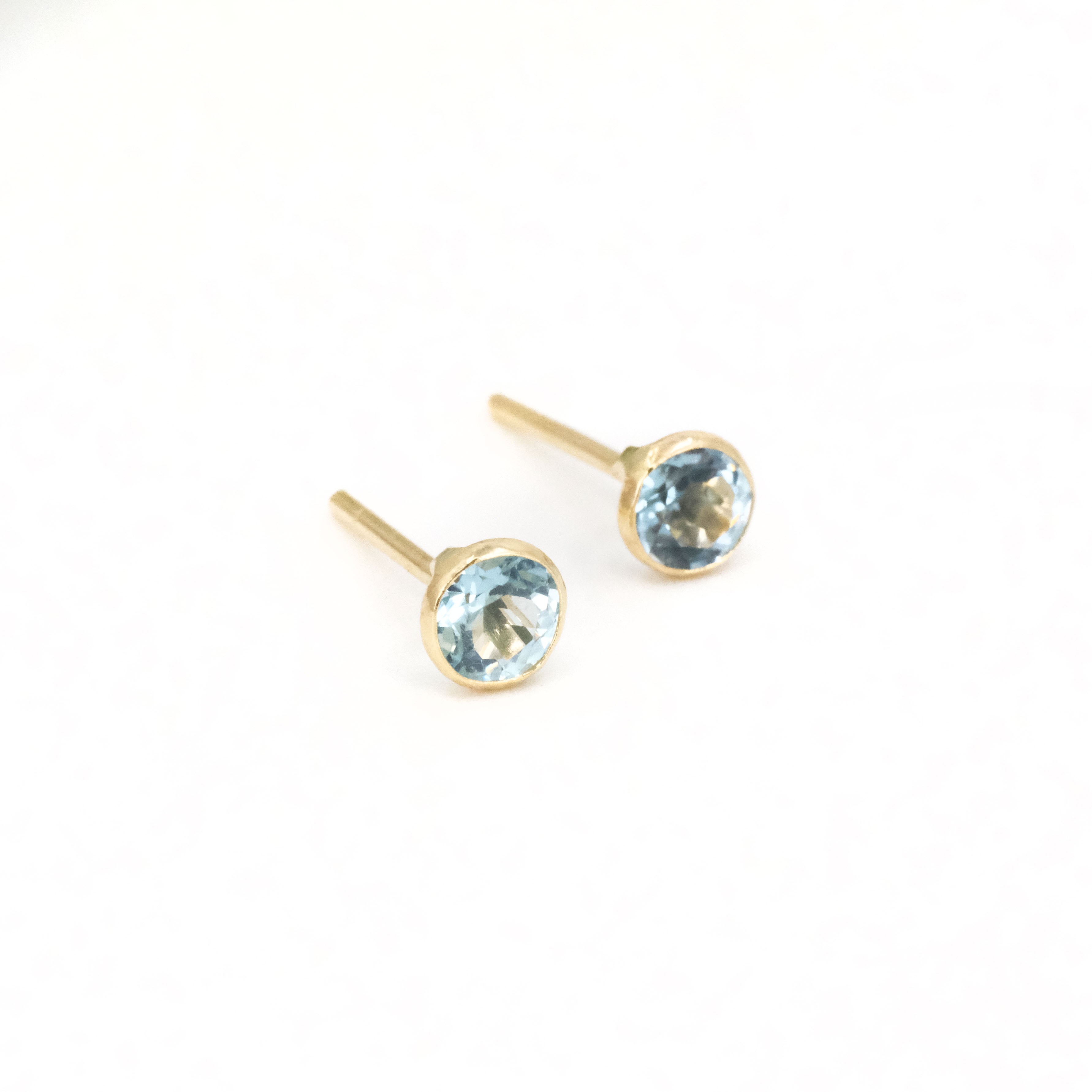 14k + Sky Blue Topaz Saddle Studs