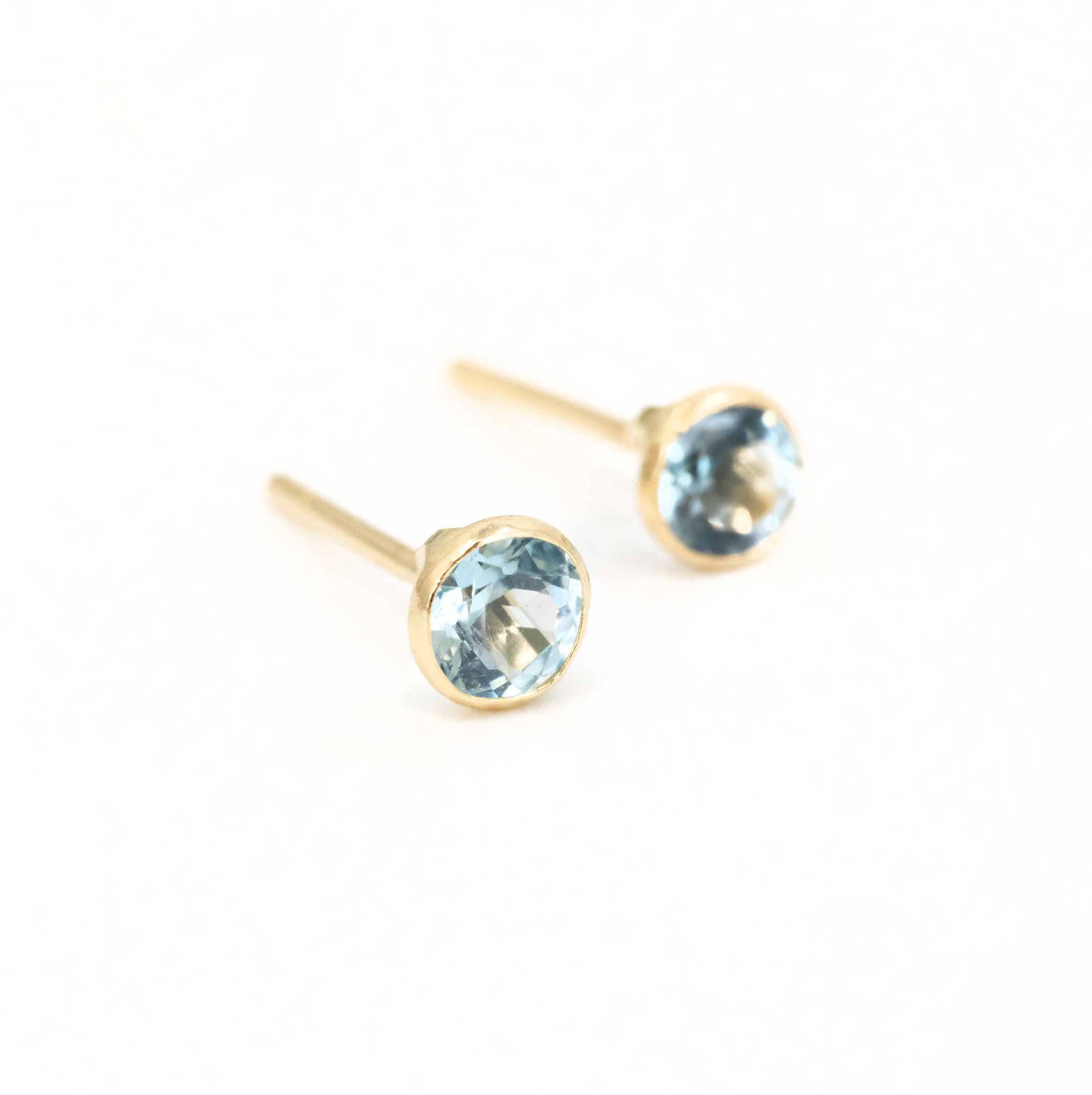 14k + Sky Blue Topaz Saddle Studs