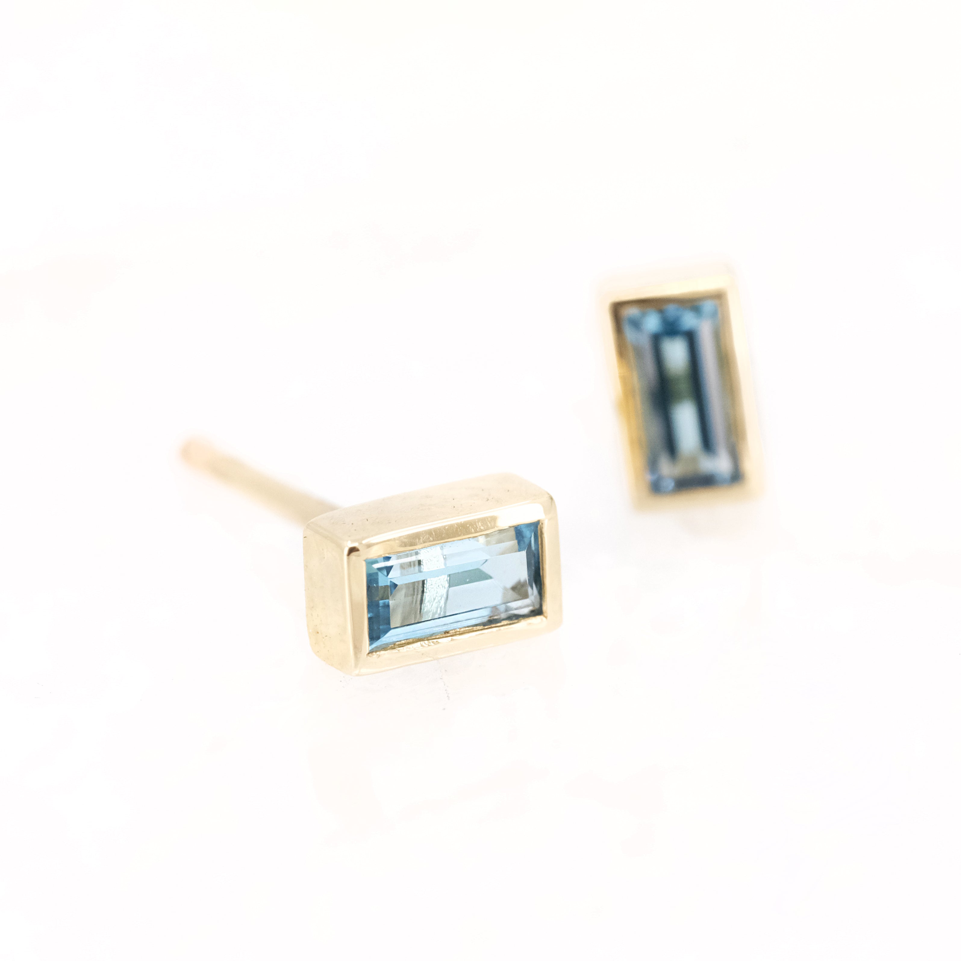 14k + Swiss Topaz Baguette Studs